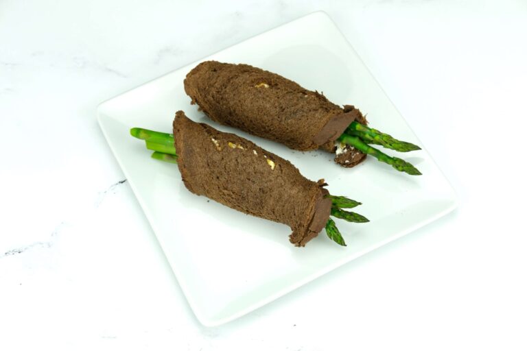beautifully plated Asparagus Rolls with cream cheese