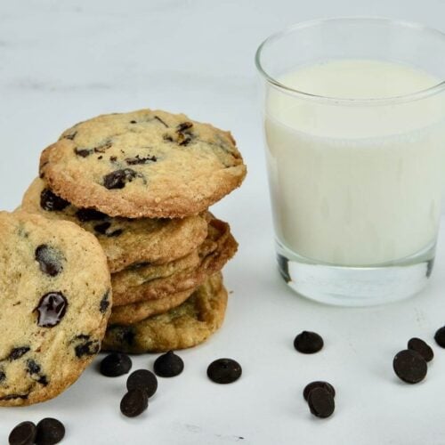emotional support cookies with chocolate chips and a glass of milk