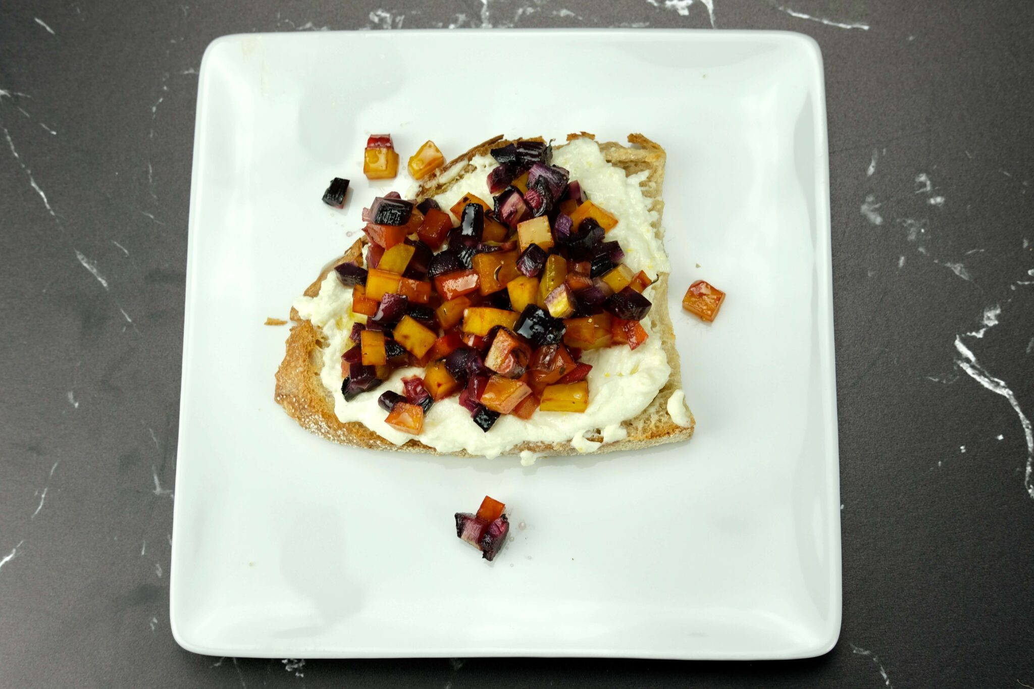 a beautiful serving of goat cheese toasts with roasted root vegetables
