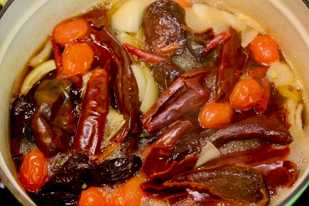 sauteed ingredients for braising the beef for birria enchiladas