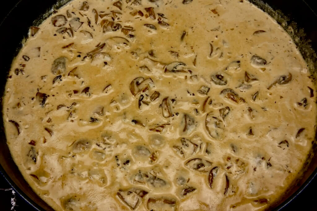 simmering balsamic cream sauce for the pasta with mushrooms dish