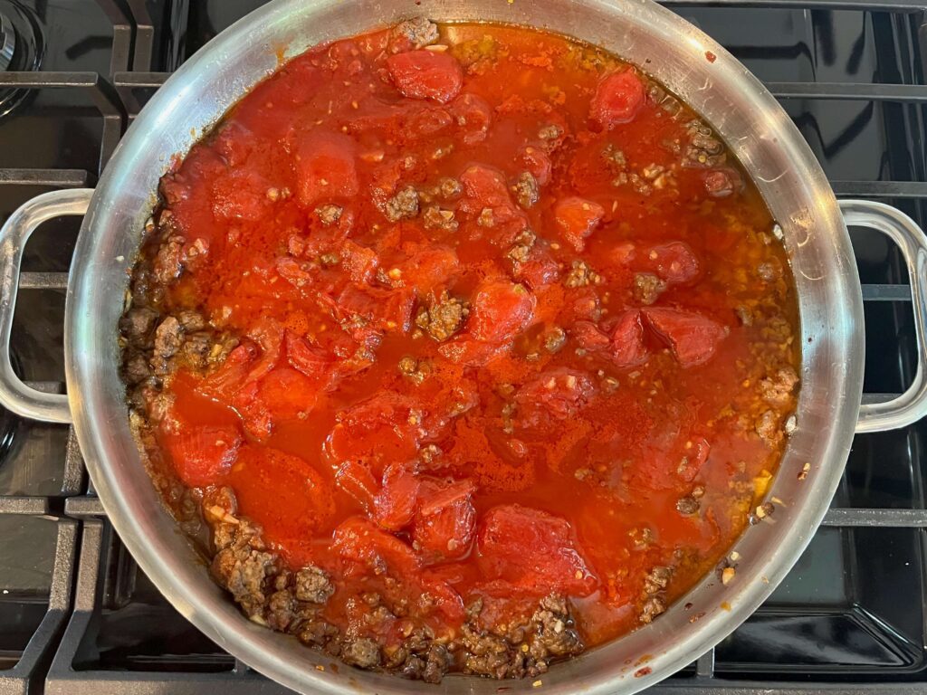 ground beef with the spices and tomato sauce