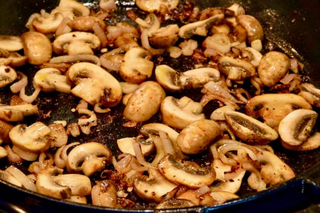 browned shallots and mushroom after 3 minutes on the pan
