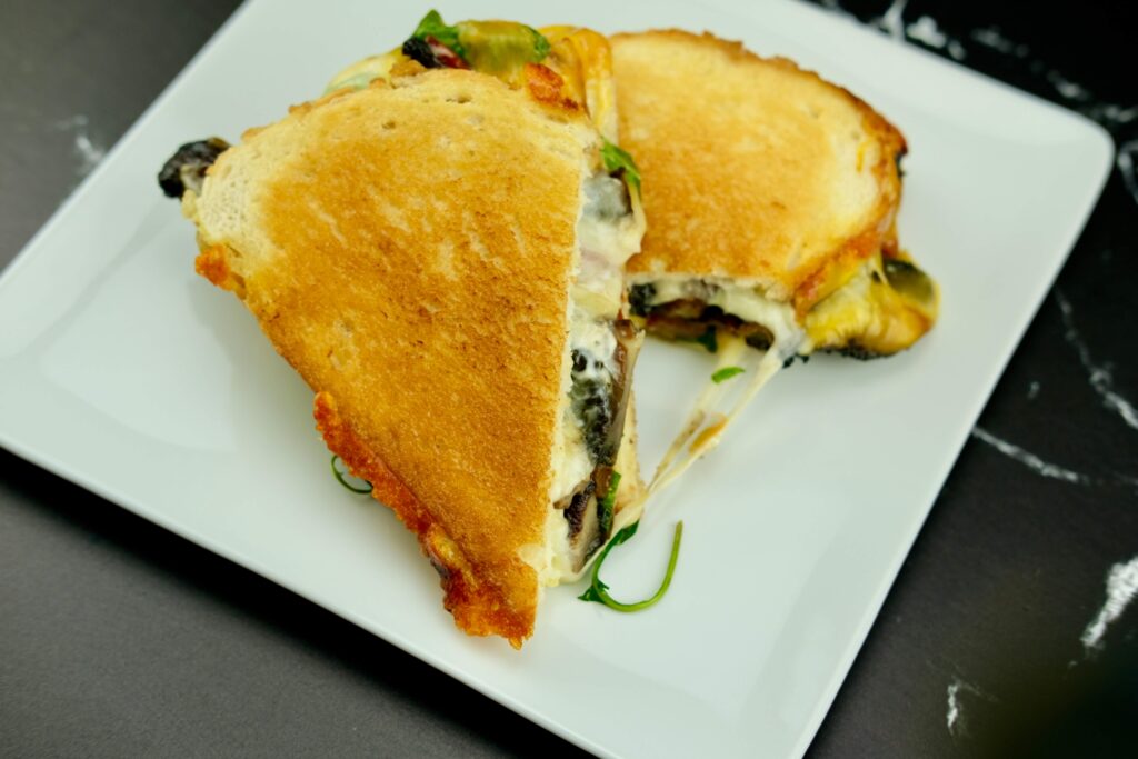 beatifully plated Smoky Portobello Grilled Cheese Sandwich
