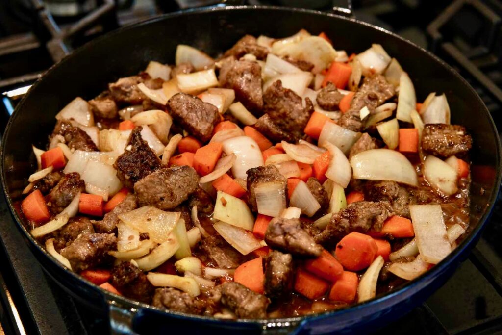 seared beef and vegetables for Beef and Red Wine Slow Cooker Stew