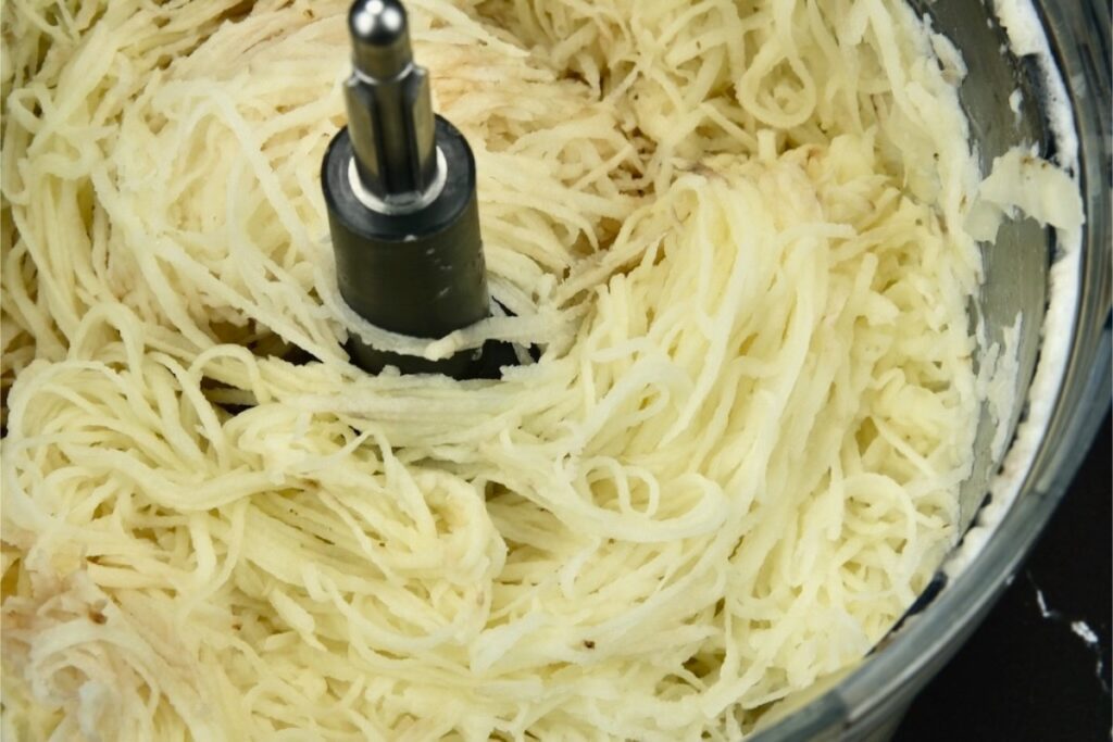 shredded potatoes and onions for the potato latkes recipe