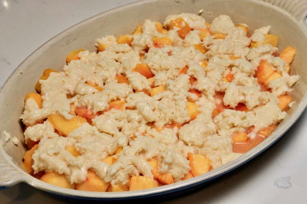 homemade peach cobbler ready for baking