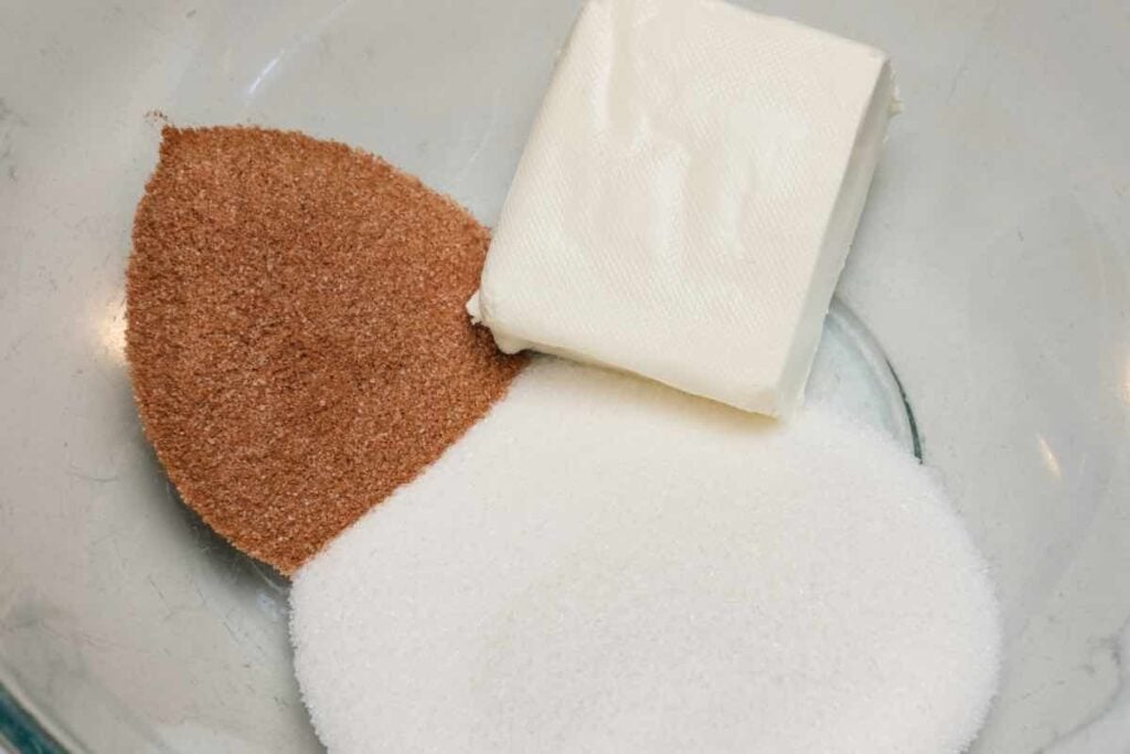 mixing the ingredients for the peach cobbler filling