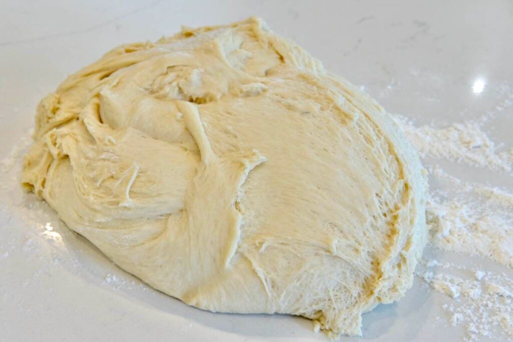 kneading challah dough